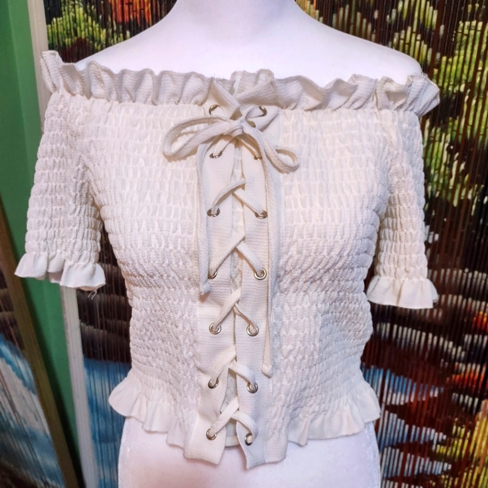Rue 21 size med/large cream color